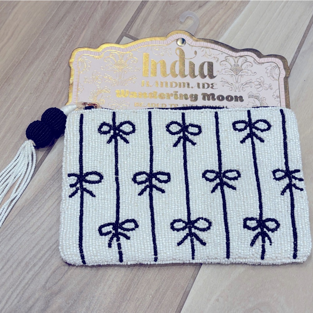 NWT Wandering Moon hand beaded travel pouch with black and white Bow Design